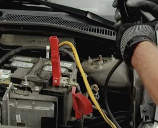 Jumper cables on a dead battery.