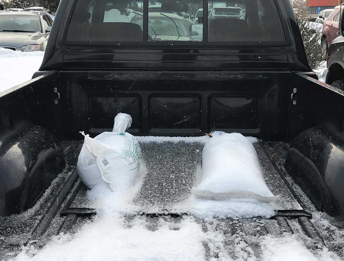 Sandbags in bed of pickup truck