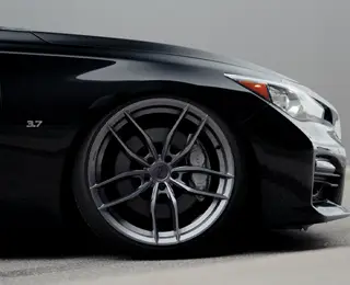 Black sports car with Niche wheel