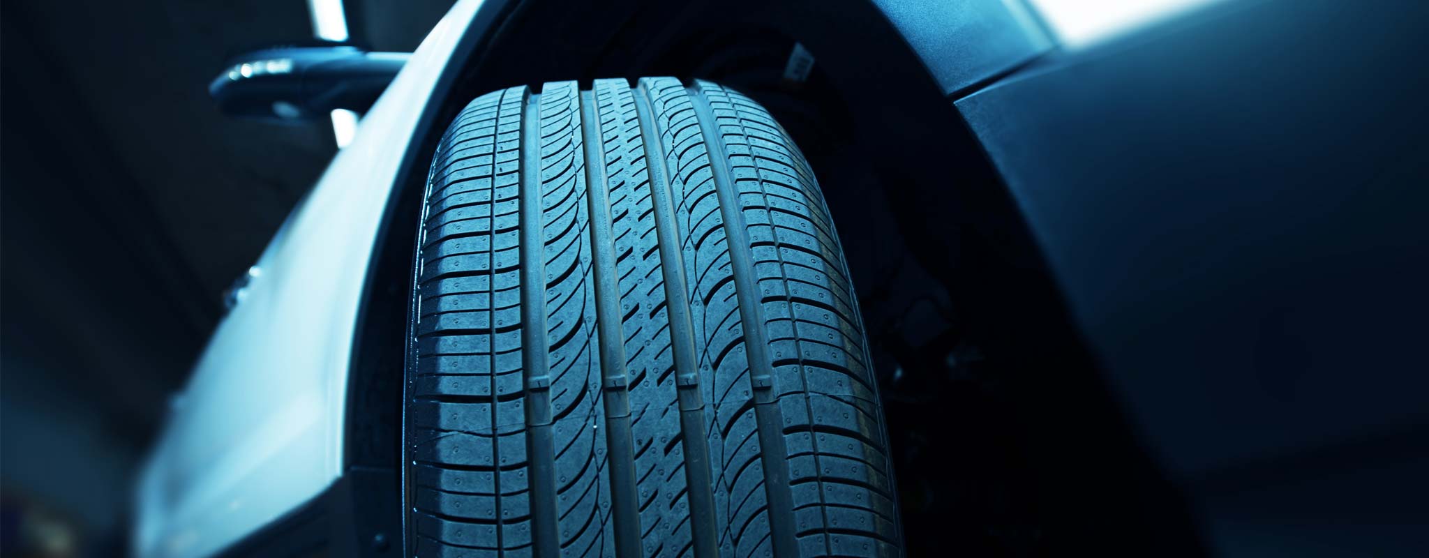 Close up of a front tire on a vehicle.