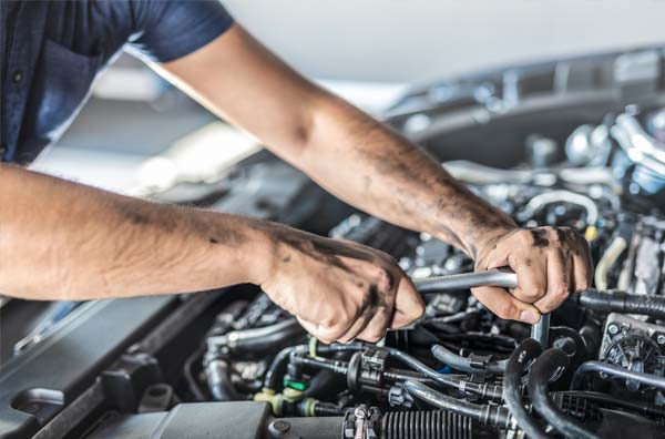 Mechanic working on car