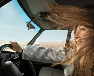 Woman driving a car