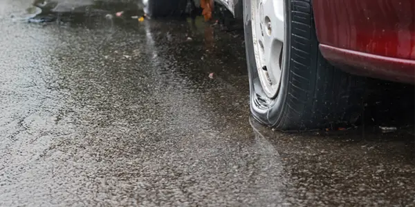 How to Handle a Popped Tire While Driving