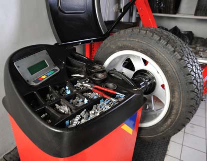 Wheel and tire on whel balancing machine.