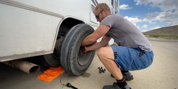 Changing a flat tire on a motorhome