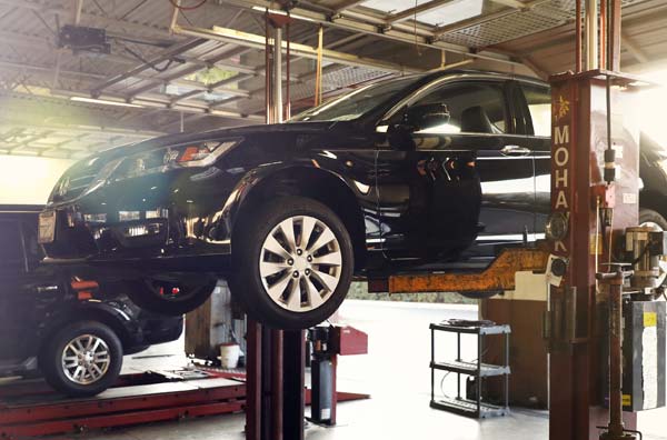 Car on mechanic lift