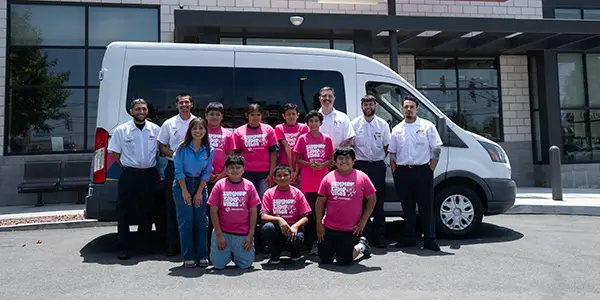 Les Schwab team members with kids from the Boys & Girls Clubs of Greater Redlands-Riverside