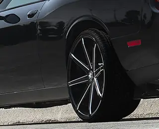 Red lowrider truck with DUB wheels