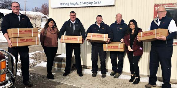 Les Schwab managers delivering hams to South Central Community Action Partnership in Idaho’s Magic Valley