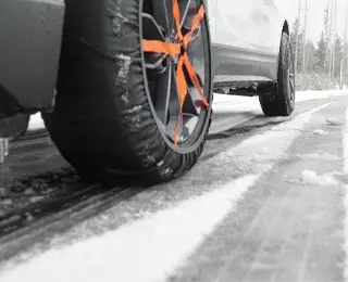 Tire socks on a crossover vehicle driving on snow and ice