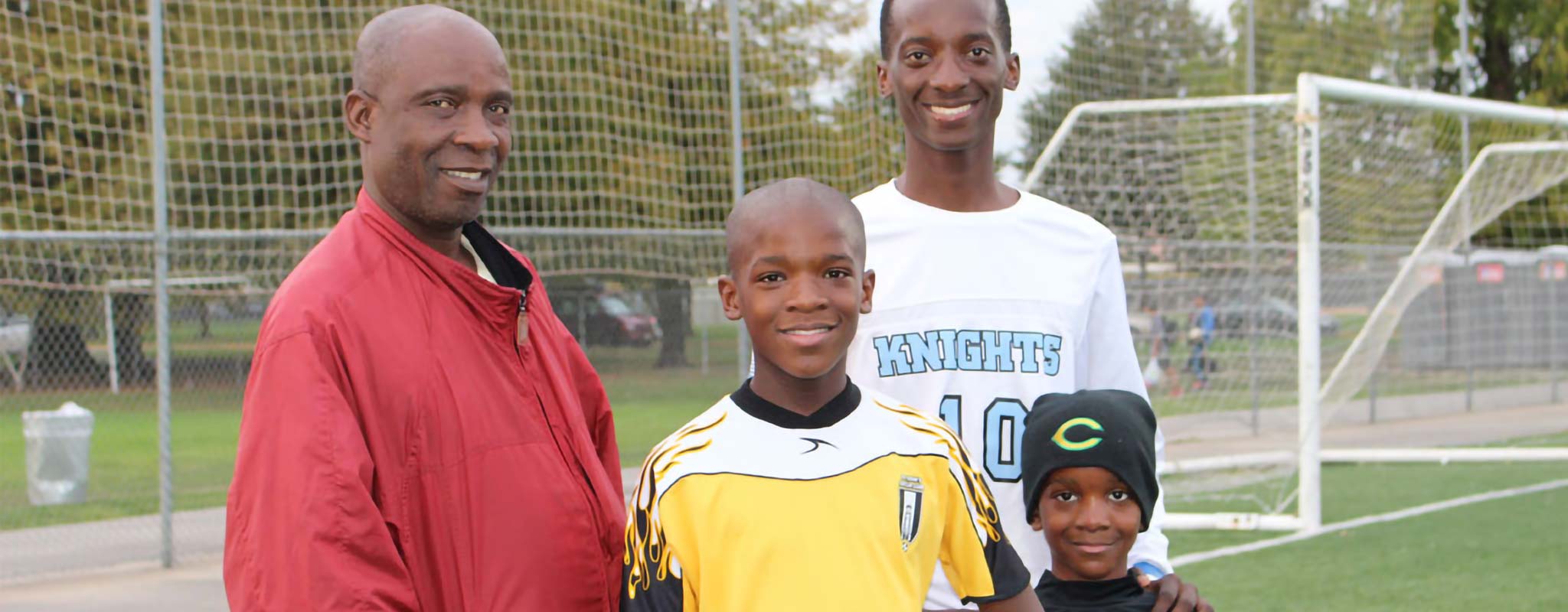 Felix Songolo of the varsity boys’ soccer team at De La Salle North Catholic High School with some family members.