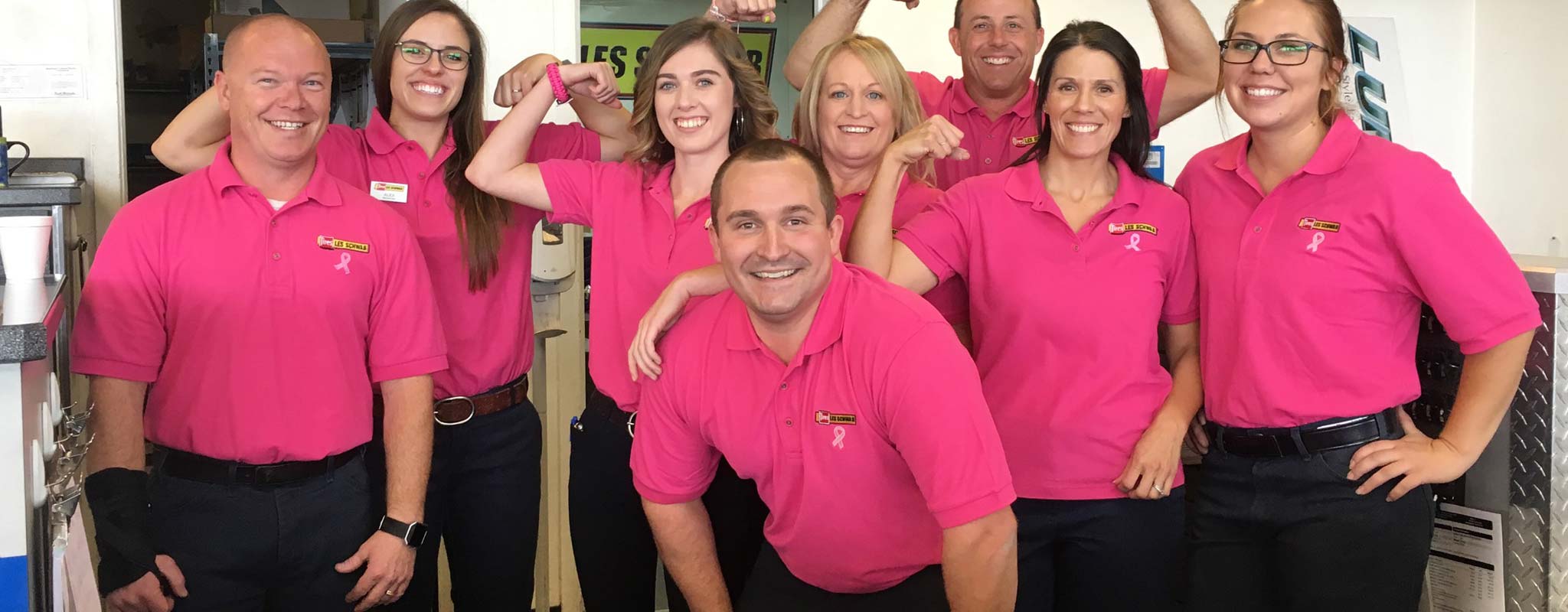 Les Schwab employees wear pink for breast cancer awareness.