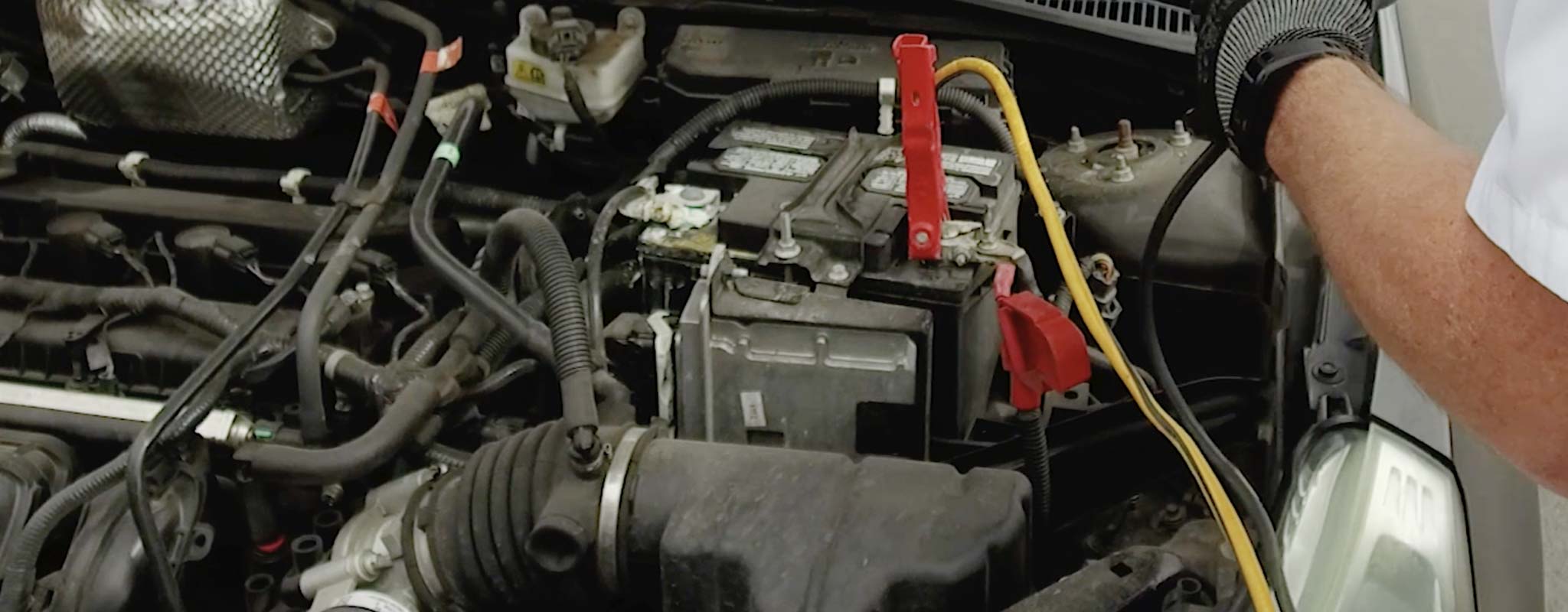 Jumper cables on a dead battery.