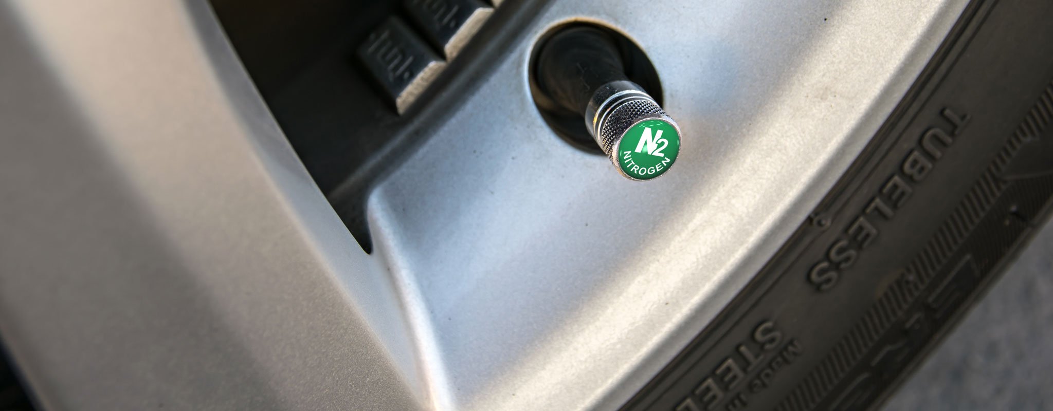 A green valve stem cap indicating Nitrogen filled.