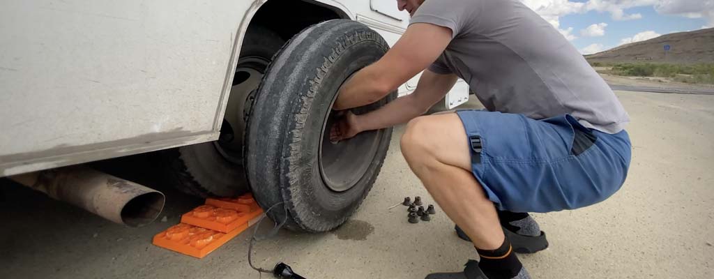 Changing a flat tire on a motorhome