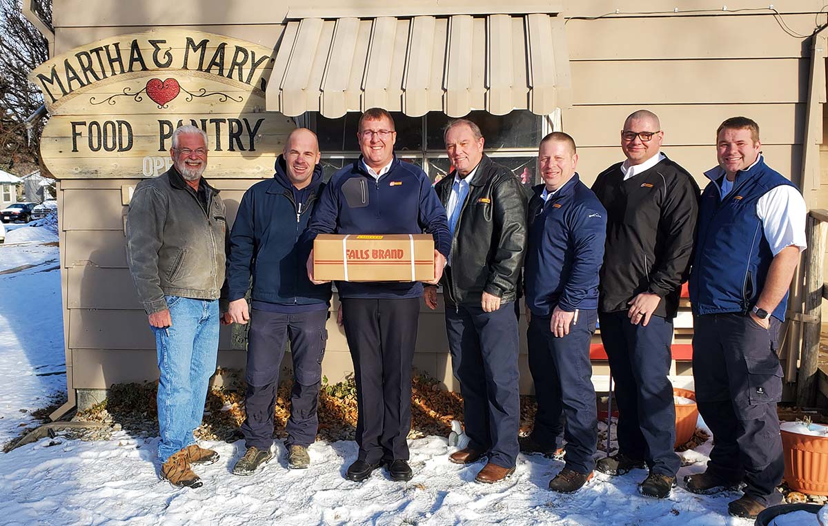 Les Schwab managers delivering hams to Martha & Mary’s Food Pantry in Jerome, Idaho