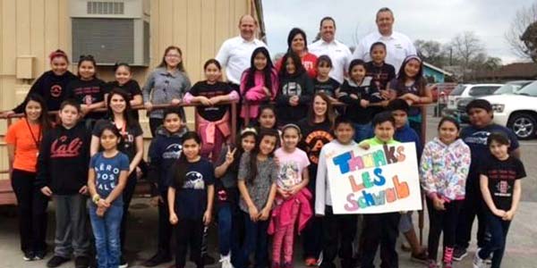 August Knodt Elementary students and teachers with Les Schwab store managers.